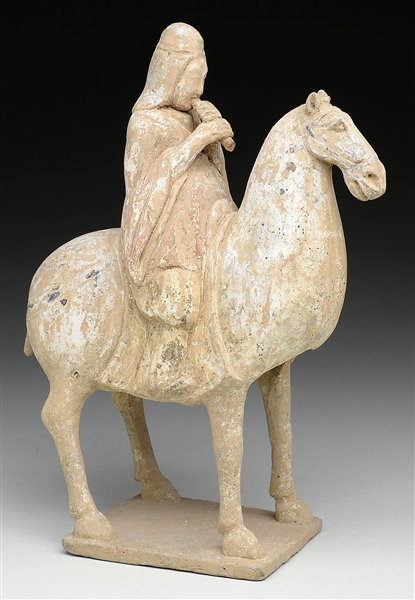 POTTERY STATUE OF HORSE AND RIDER.                                                                                                                                                                      