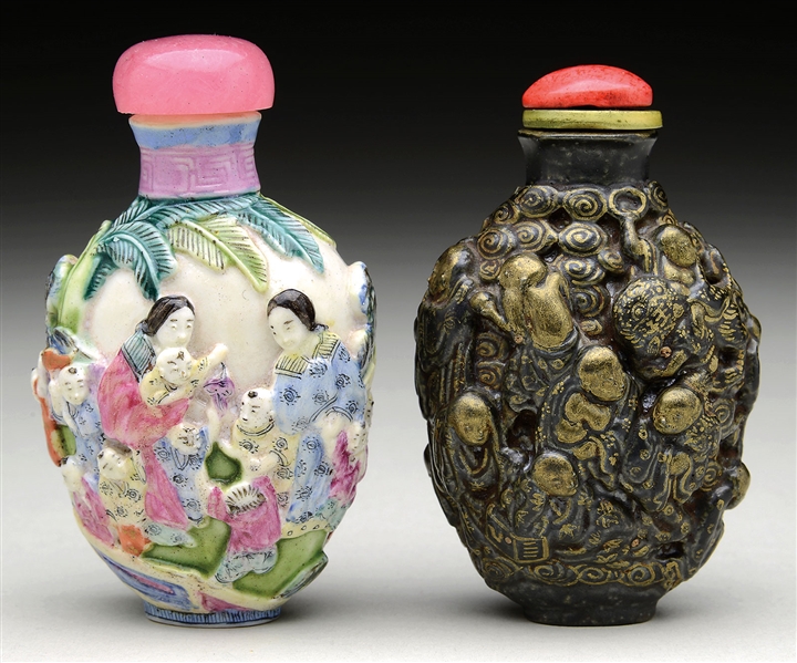TWO RELIEF DECORATED PORCELAIN SNUFF BOTTLES.                                                                                                                                                           