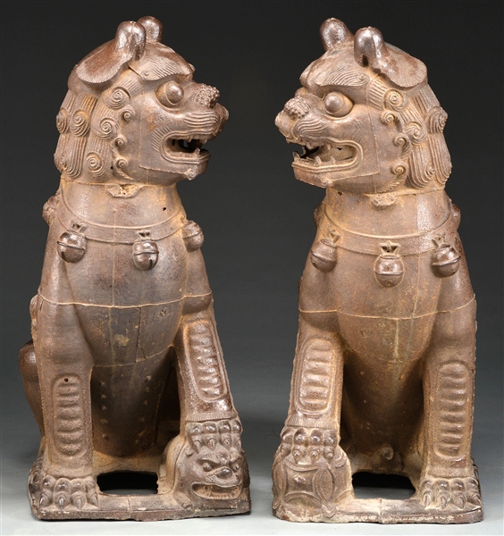 MONUMENTAL AND EXTREMELY RARE PAIR OF CAST IRON BUDDHIST LIONS.                                                                                                                                         
