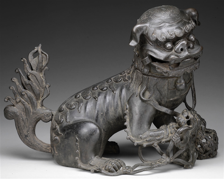 FINELY CAST BRONZE MODEL OF A FOO LION AND CUB.                                                                                                                                                         