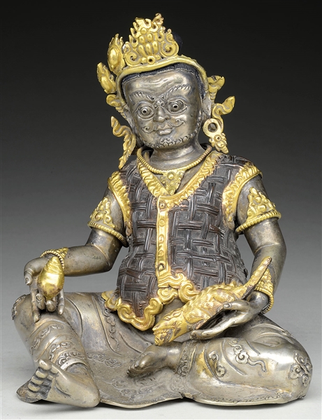 SILVERED COPPER ALLOY FIGURE OF KUBERA.                                                                                                                                                                 