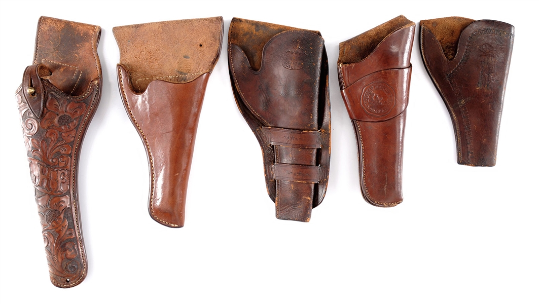 GROUP OF FIVE HOLSTERS.                                                                                                                                                                                 