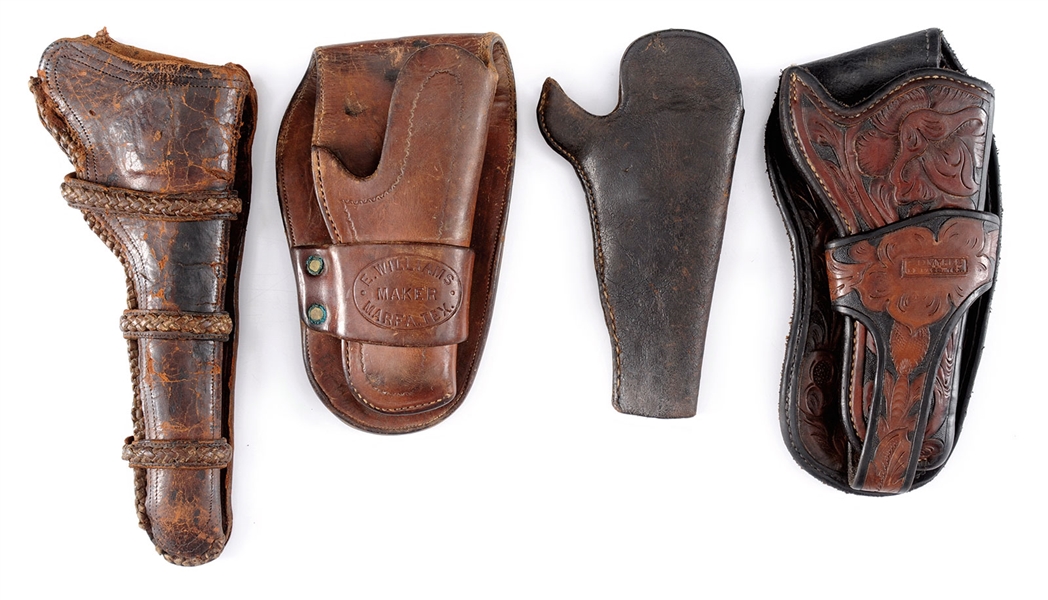 GROUP OF FOUR HOLSTERS.                                                                                                                                                                                 