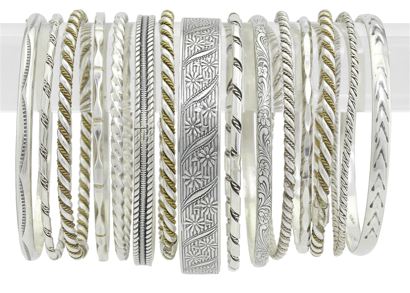 LOT OF STERLING SILVER BANGLES.                                                                                                                                                                         