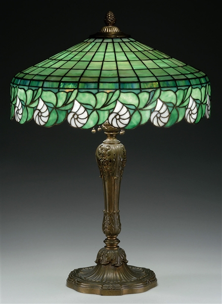 LEADED GLASS NAUTILUS SHELL TABLE LAMP.                                                                                                                                                                 