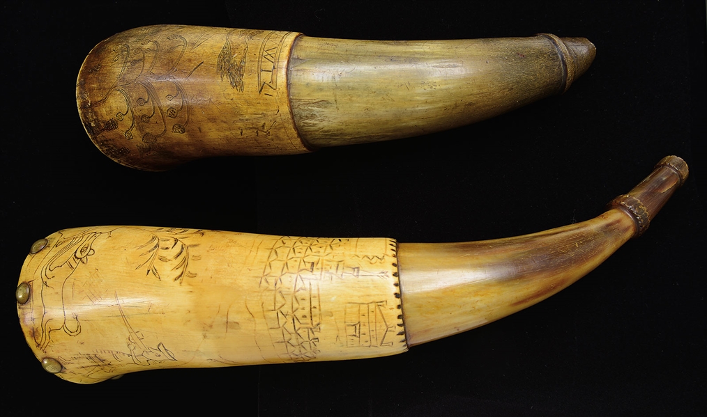 TWO 18TH CENTURY AMERICAN ENGRAVED POWDER HORNS BY "THE FOLKY ARTIST".                                                                                                                                  