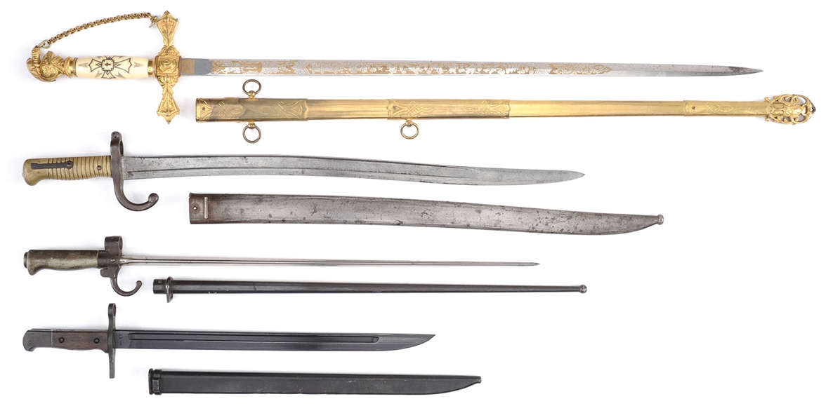 GROUPING OF FOUR EDGED WEAPONS.                                                                                                                                                                         
