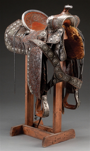 BEAUTIFUL SILVER MOUNTED SADDLE WITH MATCHING MARTINGALE BRIDLE AND BIT MADE BY EDWARD H. BOHLIN, INC. OF HOLLYWOOD, CALIFORNIA.                                                                        