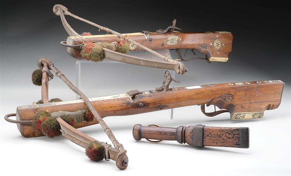 TWO GOOD 18TH CENTURY SAXON SPORTING CROSSBOWS WITH ORIGINAL GOATS FOOT LEVER DATED 1703(?).                                                                                                           