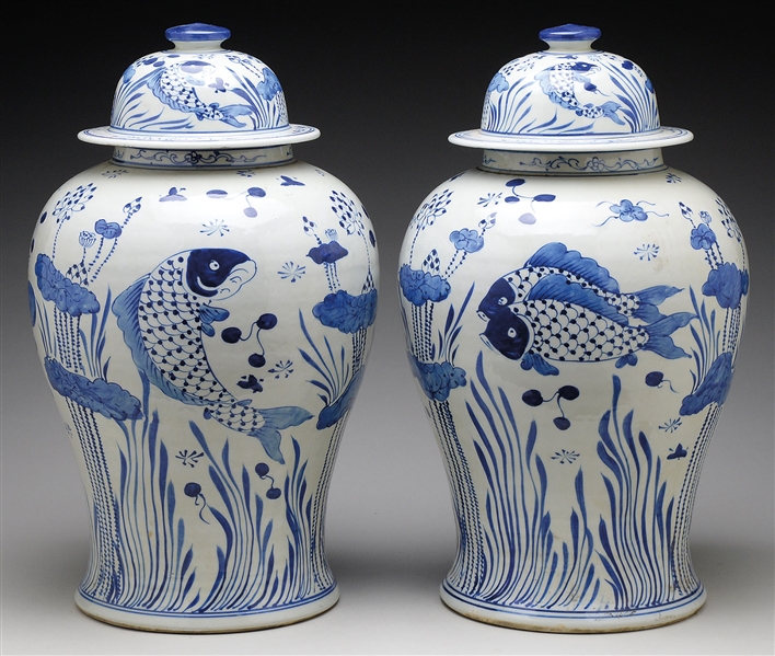 PAIR OF BLUE AND WHITE COVERED TEMPLE JARS.                                                                                                                                                             