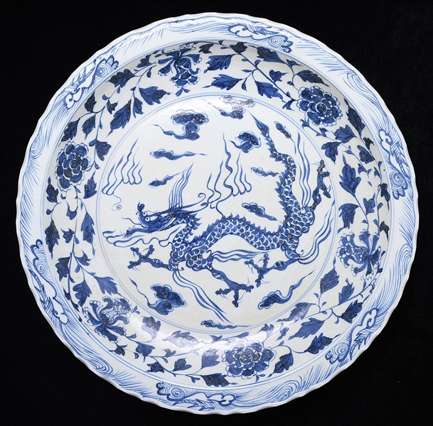 BLUE AND WHITE PORCELAIN CHARGER.                                                                                                                                                                       