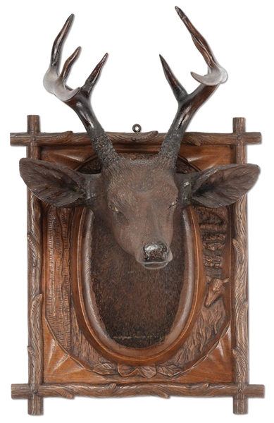 BLACK FOREST WALNUT CARVED STAGS HEAD.                                                                                                                                                                 