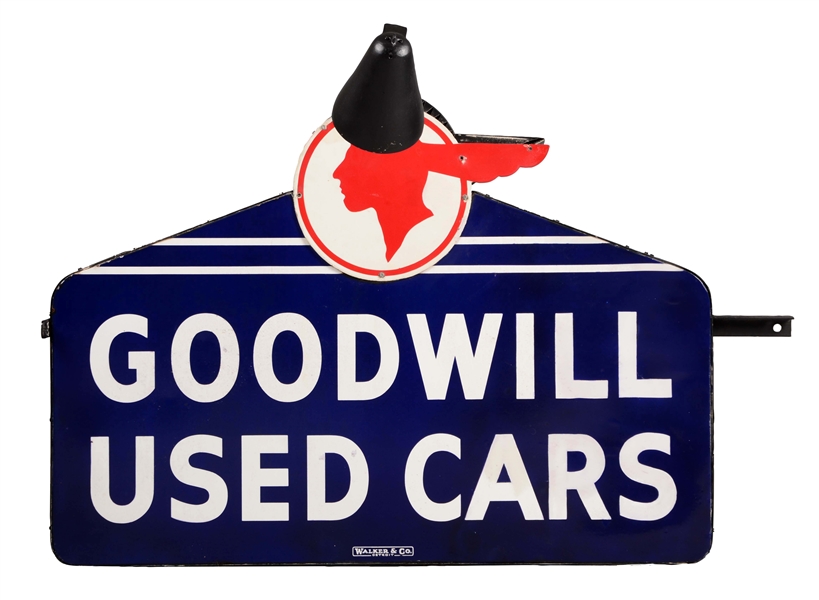 GOODWILL USED CARS DIE-CUT PORCELAIN DEALERSHIP SIGN ON METAL CAN WITH LIGHT SCONCES.