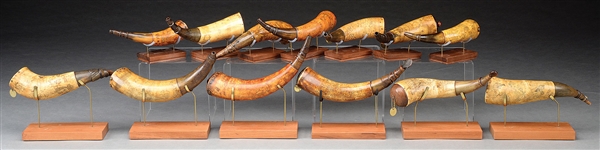 FABULOUS GROUP OF THIRTEEN REVOLUTIONARY WAR ERA POWDER HORNS CARVED BY ONE SCRIMSHAWER KNOWN AS THE "FOLKY ARTIST".                                                                                    
