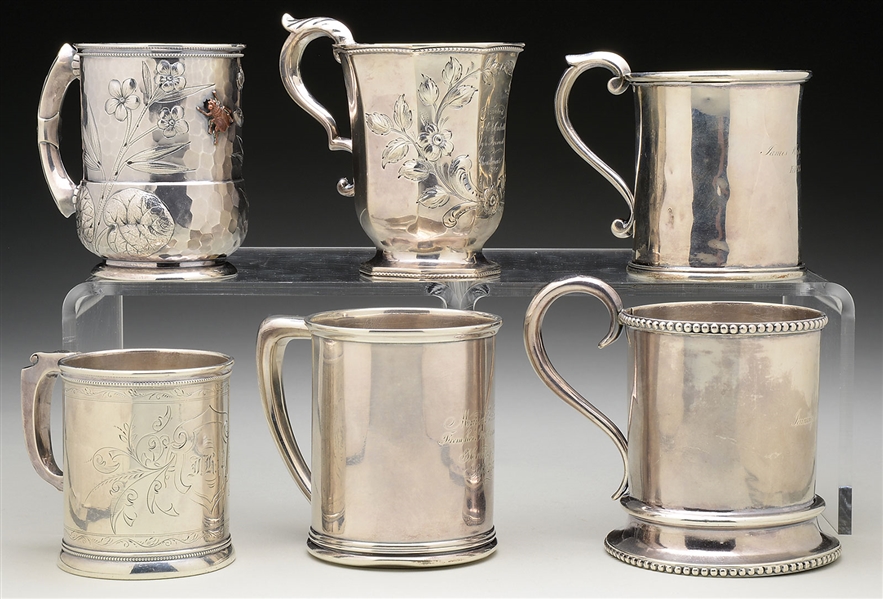 SIX STERLING AND COIN SILVER CHILDS HANDLED CUPS INCLUDING PEABODY, CABELL, AND GARNETT FAMILY INSCRIPTIONS.                                                                                           