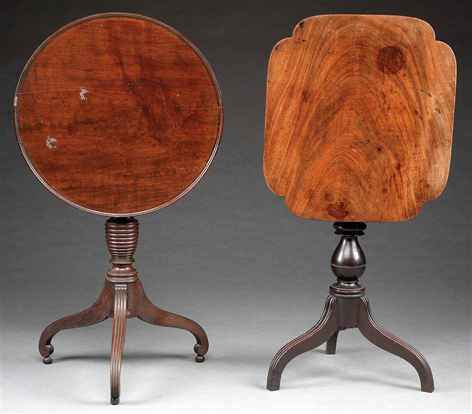 TWO SHERATON MAHOGANY TILT TOP CANDLESTANDS.                                                                                                                                                            