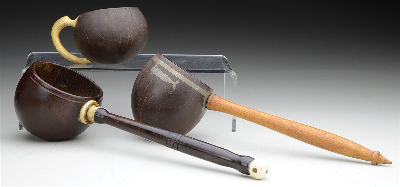 ESA - TWO COCONUT DIPPERS TOGETHER WITH A COCONUT CUP WITH HANDLE.                                                                                                                                      
