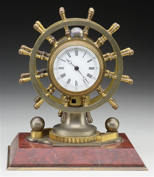 NAUTICAL THEMED DESK CLOCK WITH DOUBLE SHIPS WHEEL.                                                                                                                                                    