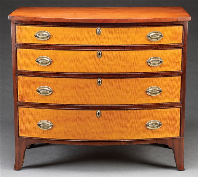 FINE FEDERAL CHERRY, MAHOGANY, AND TIGER MAPLE BOW FRONT CHEST OF DRAWERS.                                                                                                                              