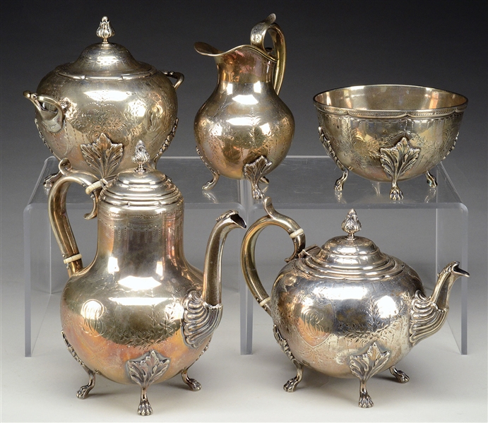 FIVE PIECE STERLING AND COIN SILVER ASSEMBLED TEA SET.                                                                                                                                                  
