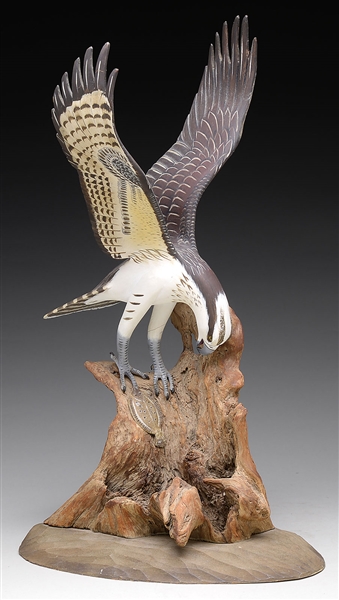 WONDERFUL CARVING OF AN OSPREY CAPTURING A FLOUNDER BY WENDELL H. GILLEY.                                                                                                                               