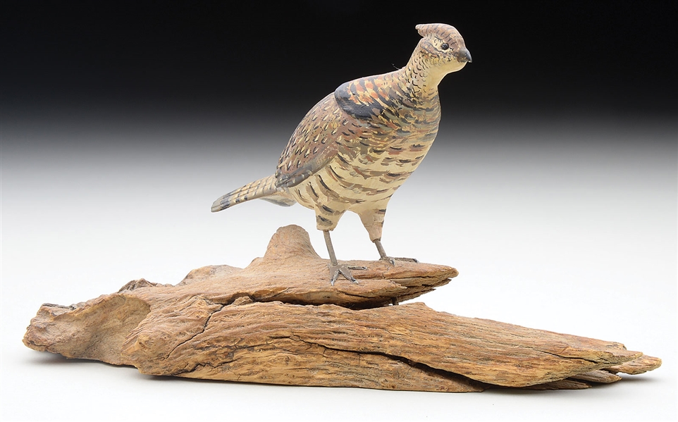 MINIATURE CARVING OF A RUFFED GROUSE BY RALPH E. STUART TOGETHER WITH A SECOND RUFFED GROUSE.                                                                                                           