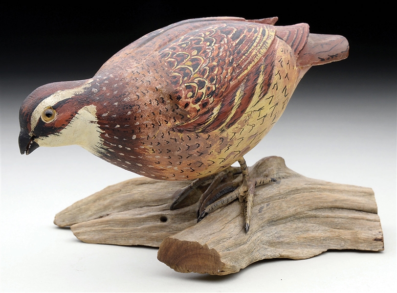 TWO CARVED AND PAINTED SCULPTURES OF QUAIL.                                                                                                                                                             