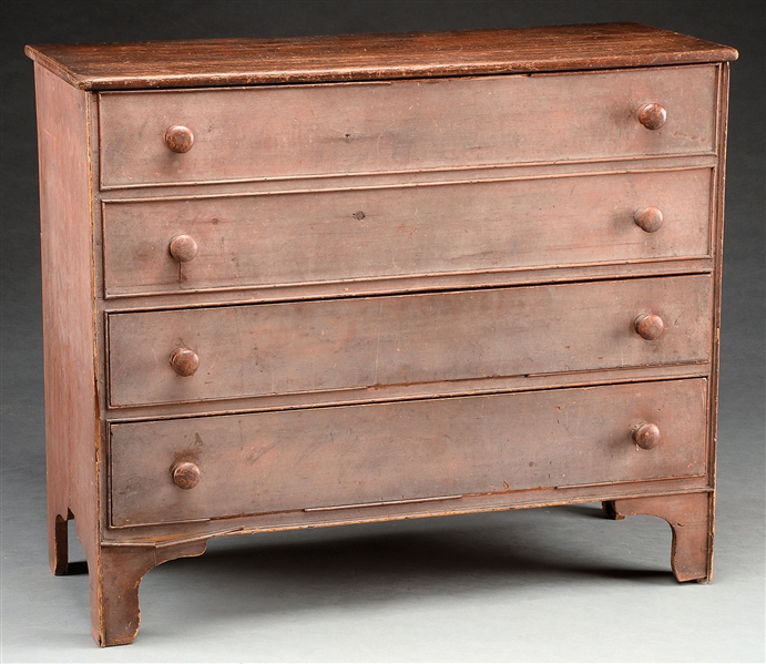 EARLY AMERICAN PINE TWO-DRAWER BLANKET CHEST IN RED PAINT.                                                                                                                                              