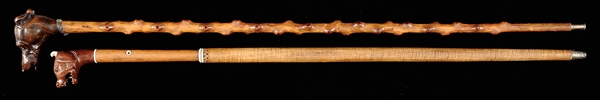 ESA - TWO FINE AND UNIQUE CARVED 19TH CENTURY DOGS HEAD WALKING STICKS.                                                                                                                                
