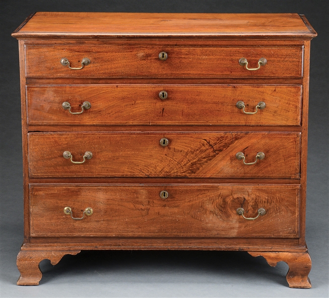 CHIPPENDALE WALNUT CHEST OF DRAWERS.                                                                                                                                                                    