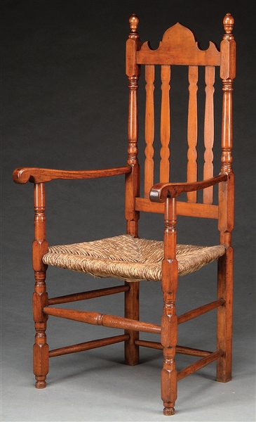 EARLY AMERICAN BANISTER BACK ARMCHAIR.                                                                                                                                                                  