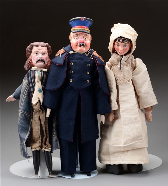 LOT OF 3: FRENCH POLICE DOLL ON STANDS & TWO EARLY PUPPETS.