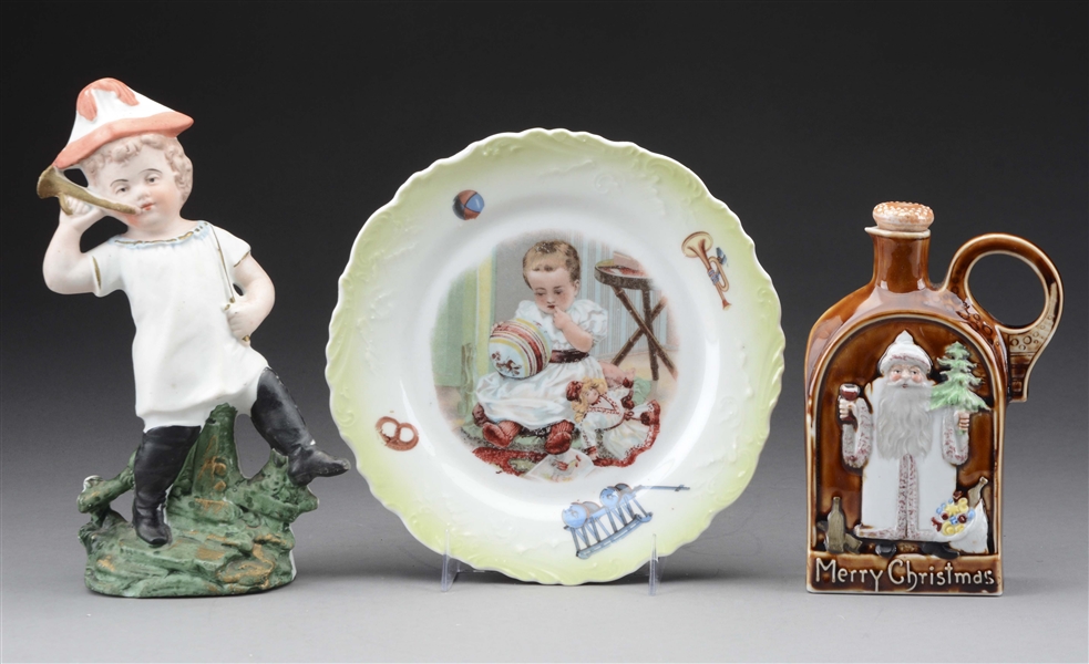 LOT OF 3: CERAMIC FLASK, BABY PLATE AND CHILD FIGURINE.