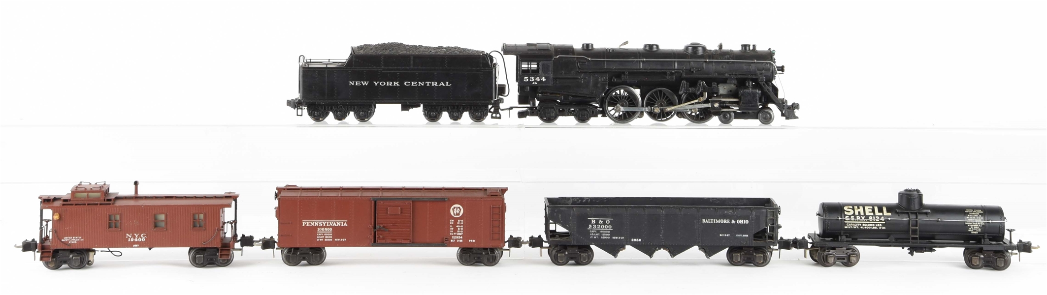 LOT OF 7: LIONEL 700E LOCOMOTIVE WITH APPROPRIATE FREIGHT CARS. 