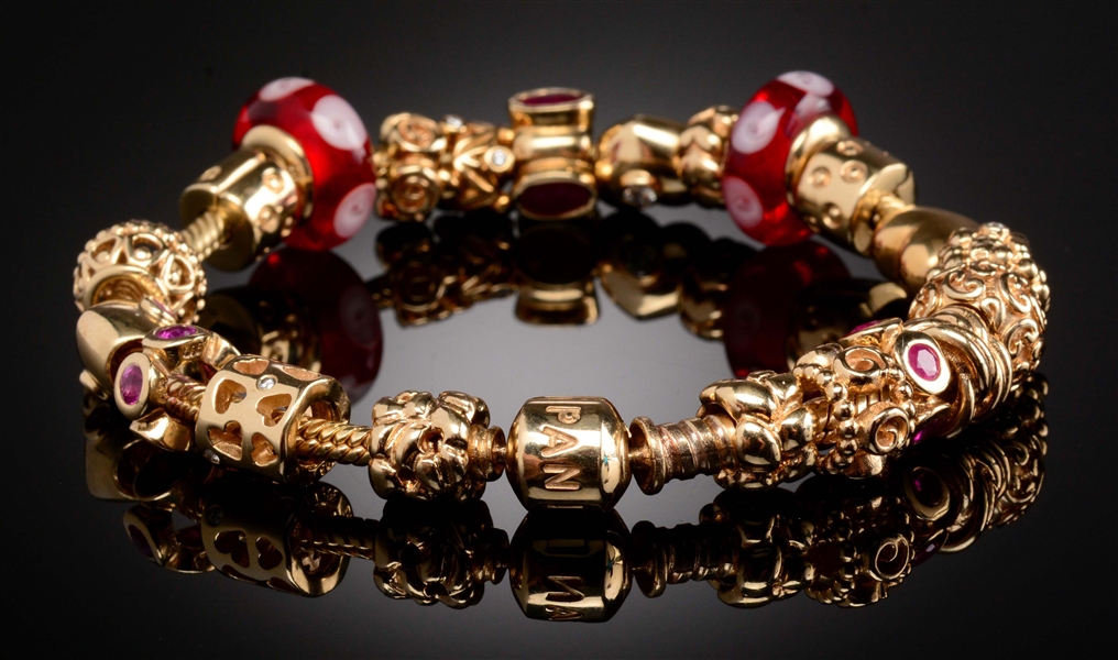 Lot Detail - 14K GOLD PANDORA BRACELET WITH 21 CHARMS & CLIPS.