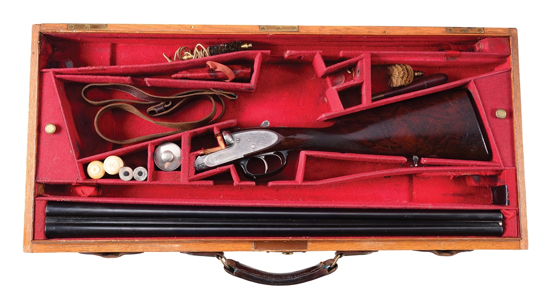 (C) UNUSUAL JAMES PURDEY & SONS GAME SHOTGUN SPECIALLY MADE WITH GERMANIC FEATURES IN ITS ORIGINAL CASE WITH ACCESSORIES. 