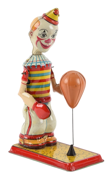 CHEIN TIN LITHO WIND-UP CLOWN PUNCHER TOY. 