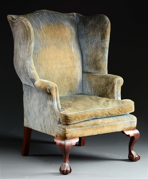 CHIPPENDALE STYLE MAHOGANY BALL AND CLAW WINGCHAIR.