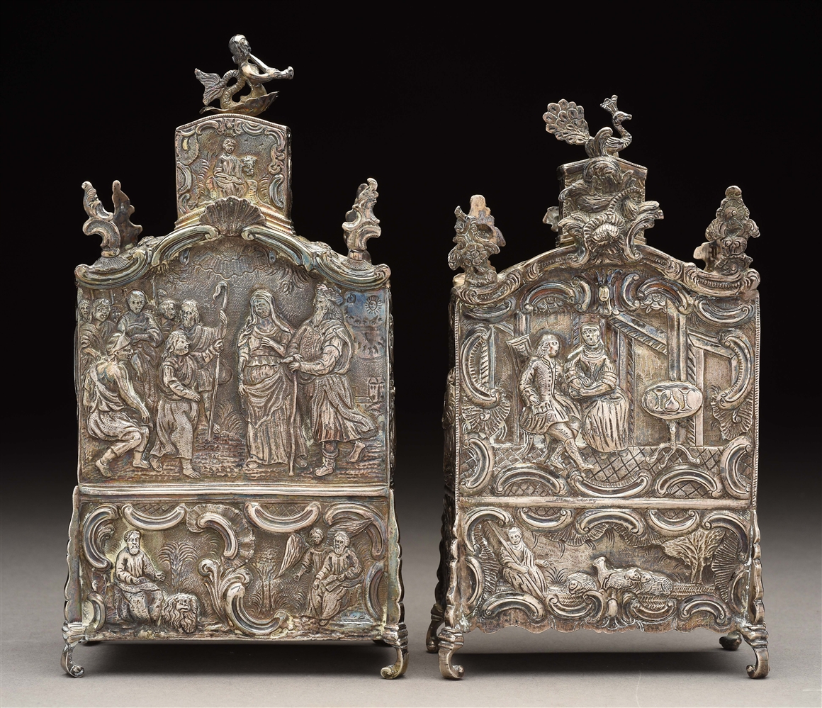 LOT OF 2: PAIR OF CONTINENTAL SILVER ROCOCO ALLEGORICAL WINE CADDIES.