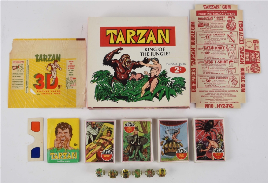 LOT OF 1950-60S "TARZAN" WAX BOX, WRAPPER, FLICKER RINGS & CARDS. 