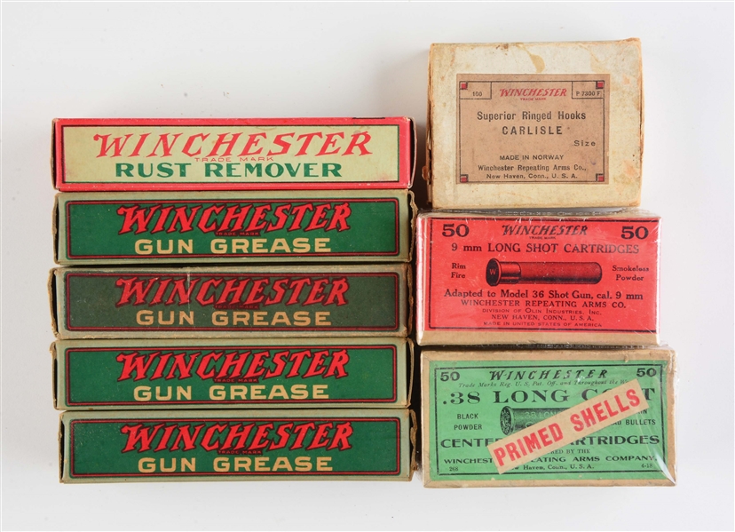 LOT OF 8: BOXES OF WINCHESTER GUN GREASE, RUST REMOVER, HOOKS, PRIMED SHELLS AND AMUNITION.