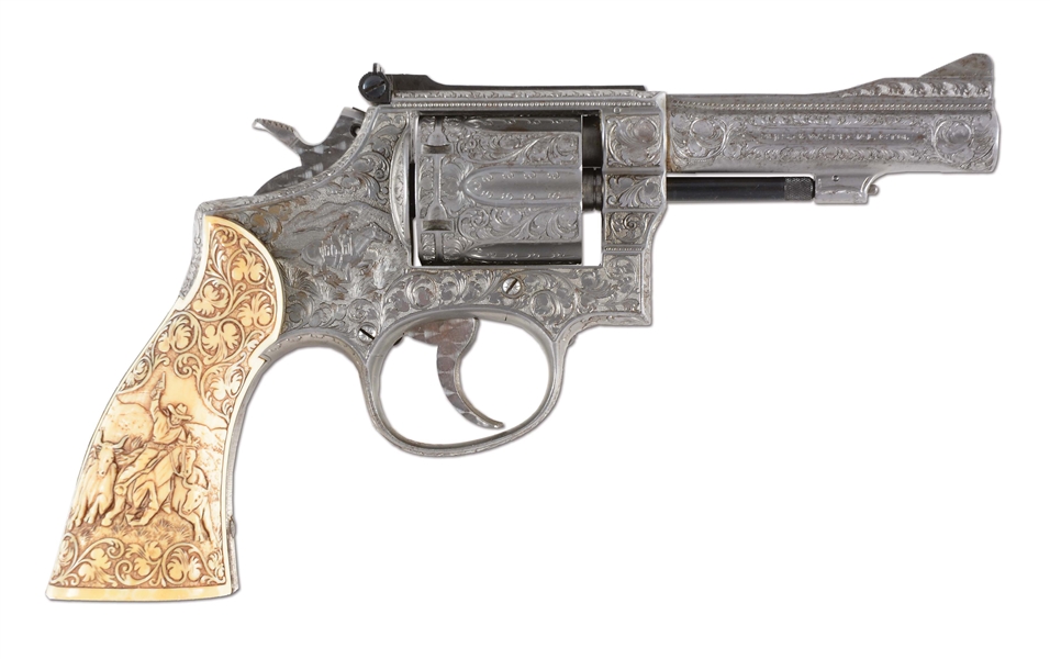 (C) WESTERN THEMED SILVER PLATED & ENGRAVED SMITH & WESSON MODEL 15 DOUBLE ACTION REVOLVER WITH CARVED IVORY GRIPS (1960).