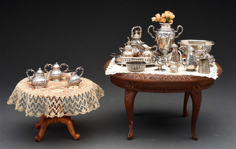 MINIATURE STERLING SILVER PIECES ON TWO TABLES.