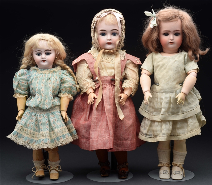 LOT OF 3: GERMAN BISQUE HEAD DOLLS.