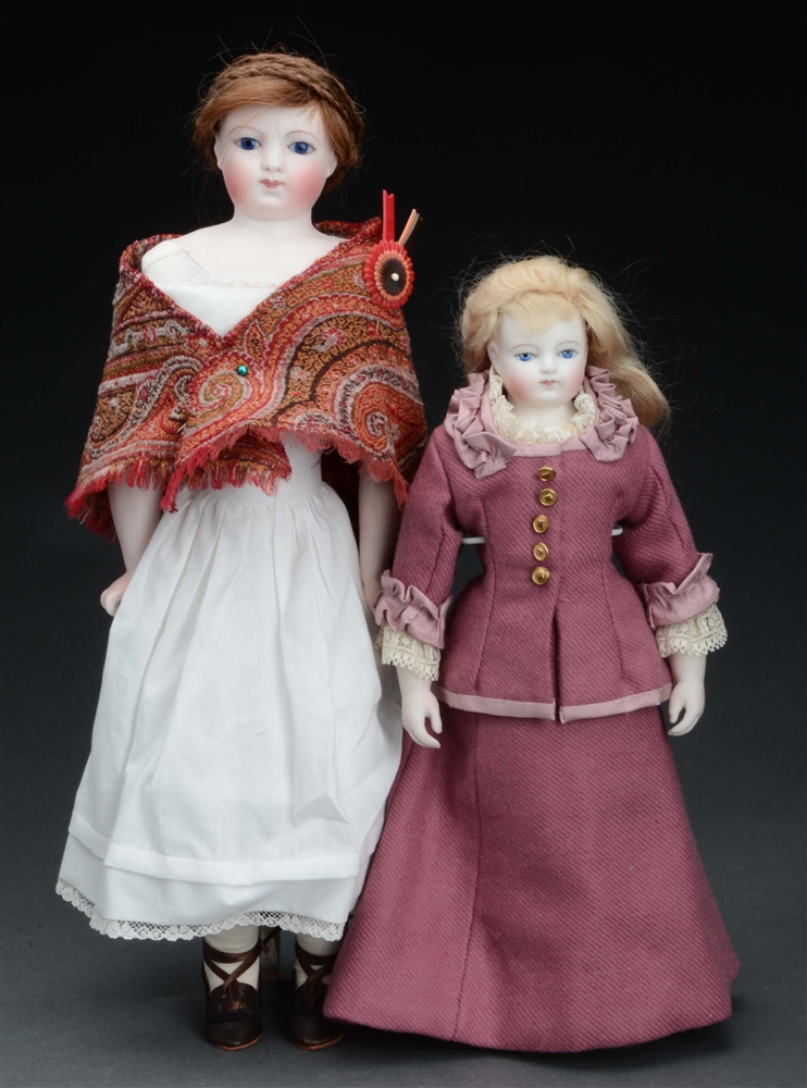 LOT OF 2: BISQUE SHOULDER HEAD FRENCH FASHION DOLLS.