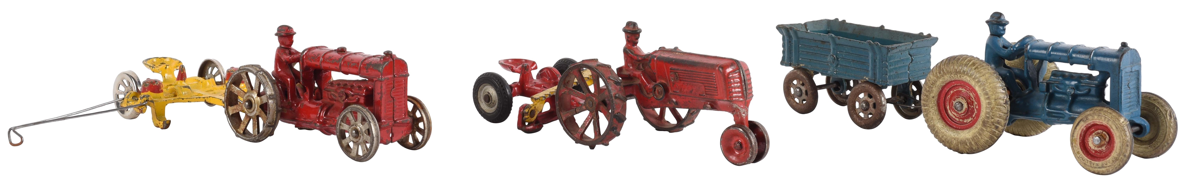 LOT OF 3: CAST IRON ARCADE TOY TRACTOR COMBINATIONS.