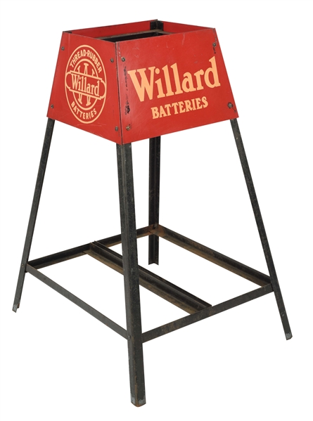 WILLARD BATTERIES SERVICE STATION BATTERY STAND WITH FOUR TIN SIGNS.