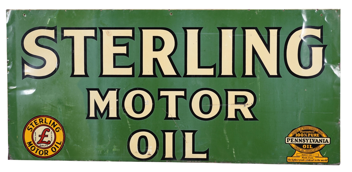STERLING MOTOR OIL TIN SIGN WITH WOOD BACKING.