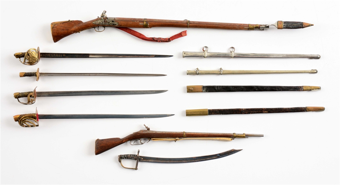 CASED GROUP OF 7: MINIATURE WEAPONS COLLECTED BY IRVING MOSKOWITZ.