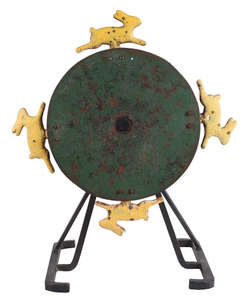 RARE CAST IRON DISK OF RUNNING RABBITS SHOOTING GALLERY TARGET.